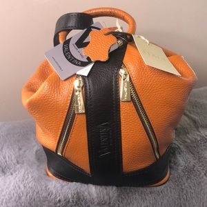 NWT. Valentina all leather purse.